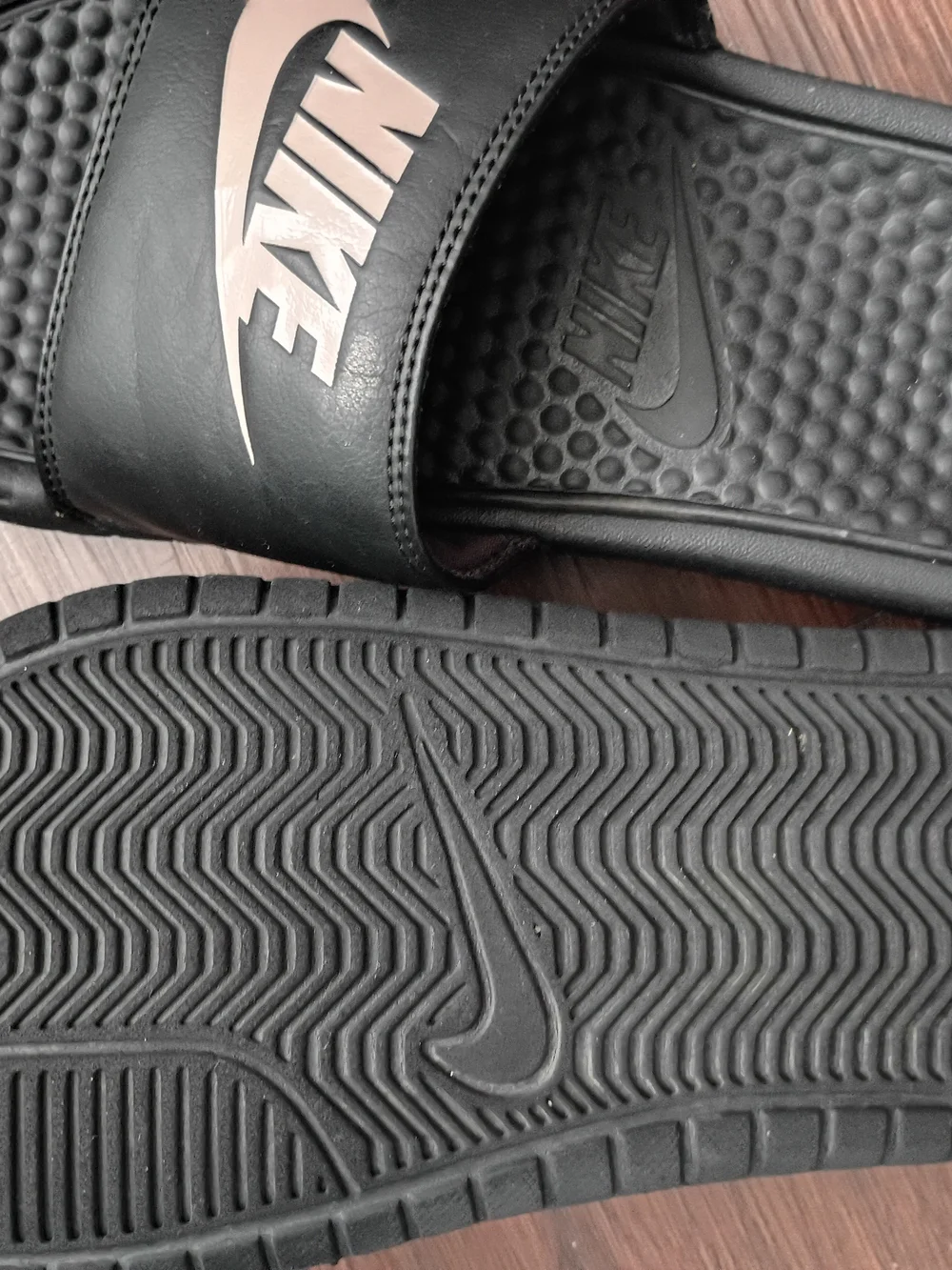 Nike Women's Black Slide Sandals with Light Pink Logo